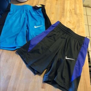 Two pair boys Nike basketball shorts